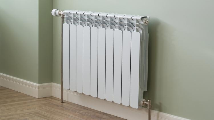 designer white radiator - cheapest ways to heat a room